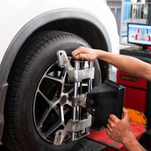 Asian,Professional,Mechanic,Near,Wheel,Center,,Wheel,Alignment,,Mount,On
